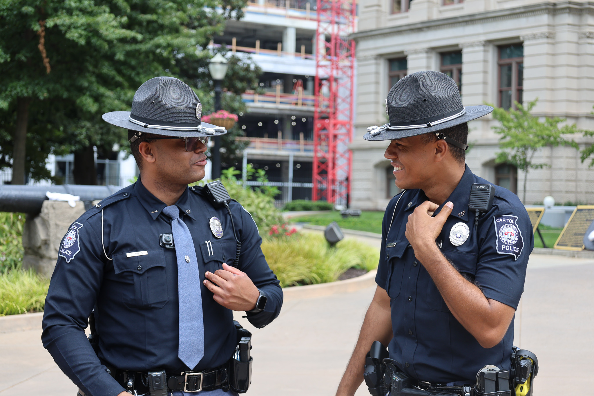 Two Capitol Police officers in conversation on the Capitol grounds
