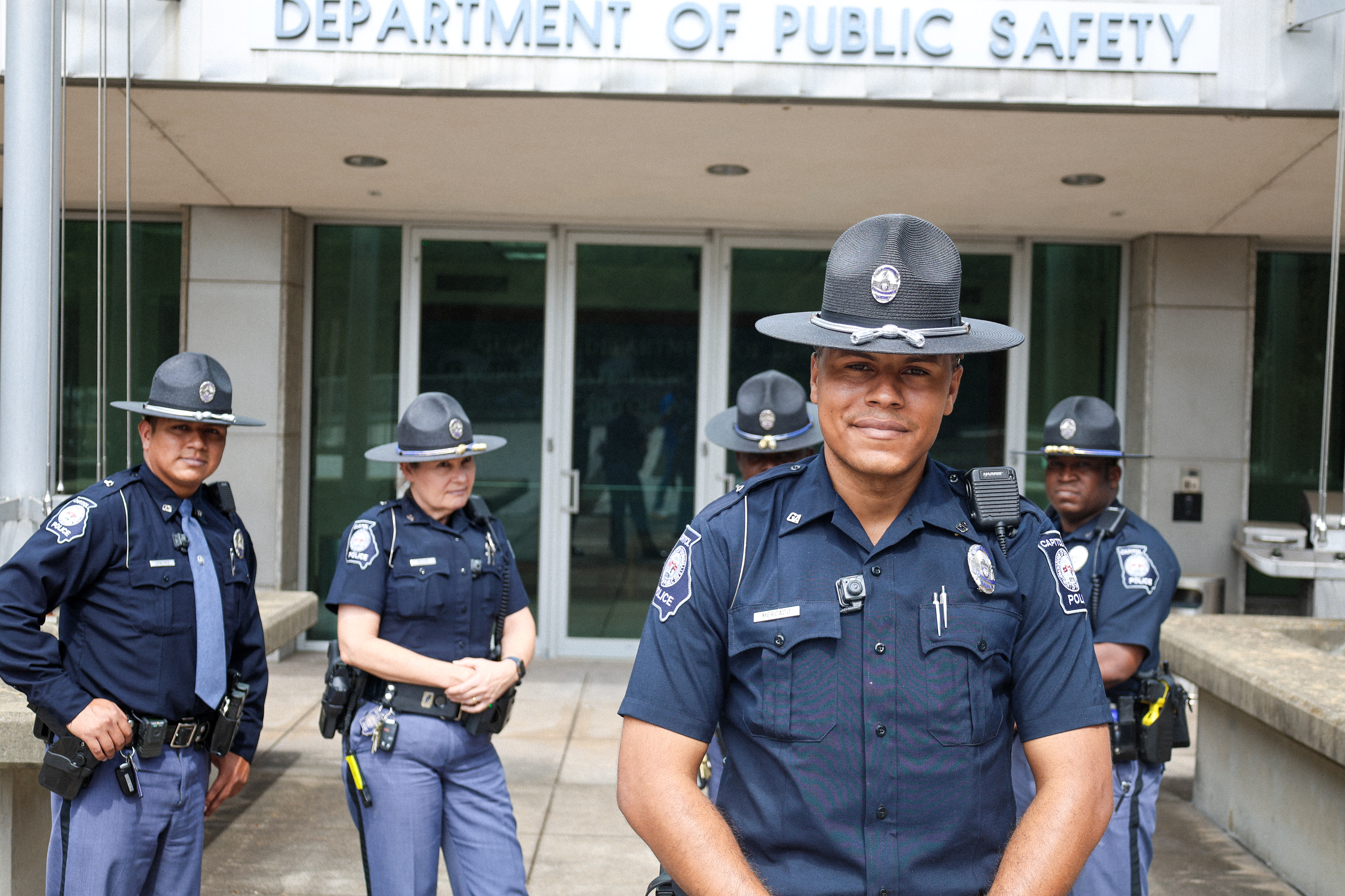 Capitol Police officers standing in front of DPS Headquarters